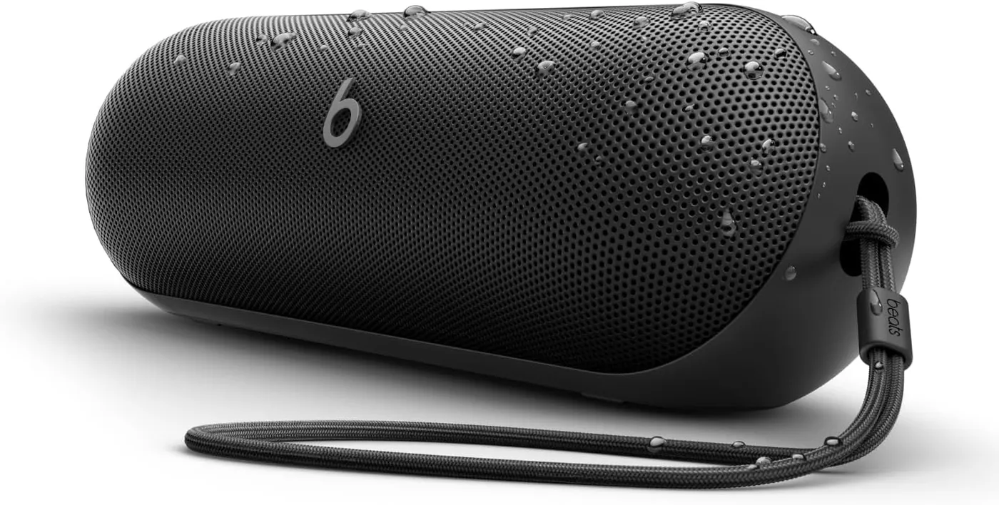 Beats Pill 2024 portable Bluetooth speaker in Matte Black with removable carry lanyard, side view